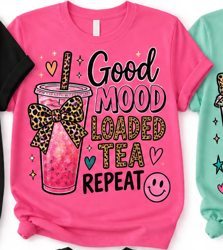 Pink shirt mockup with Good Mood Loaded Tea Repeat design