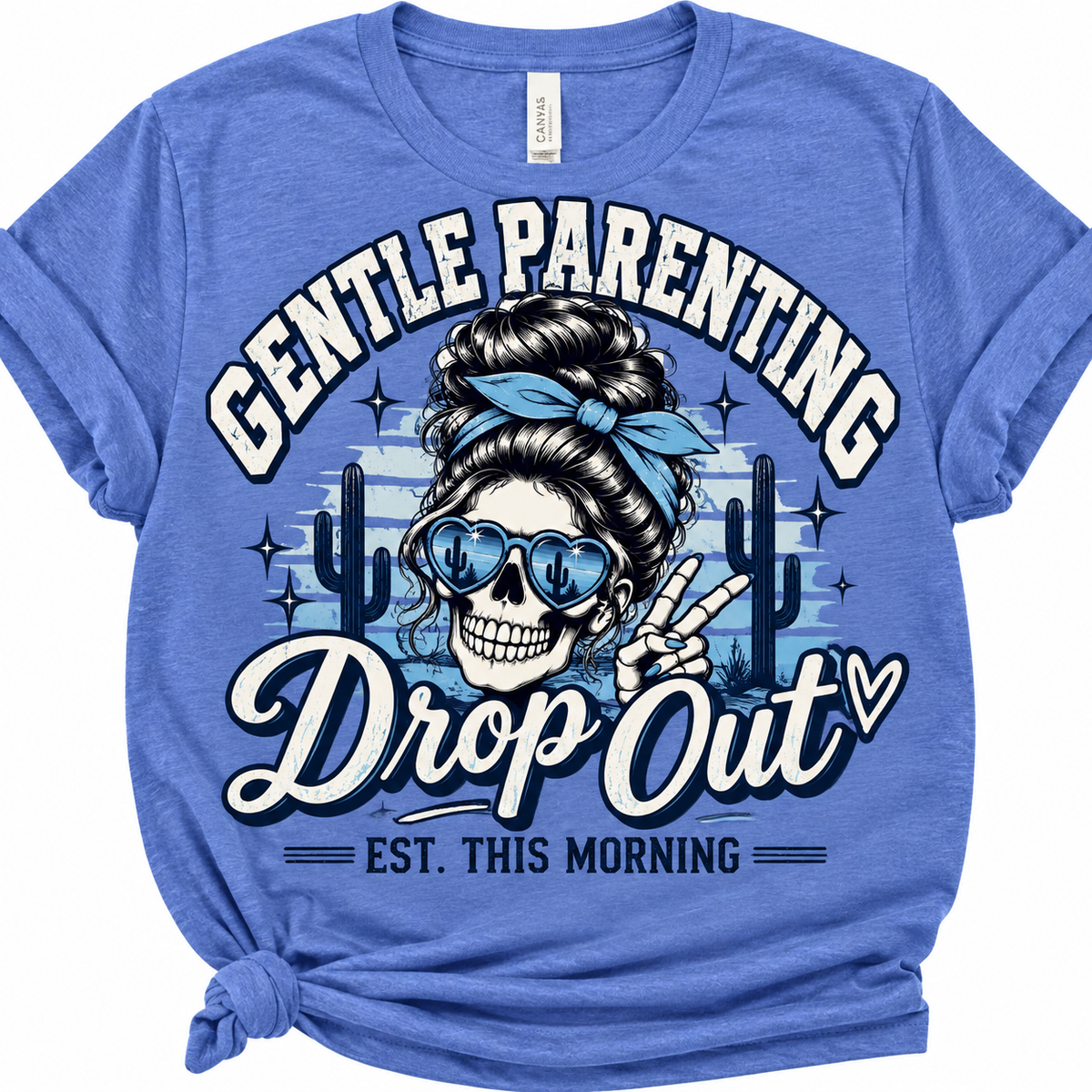 Heather Columbia blue T-shirt with a simplified navy and cream Gentle Parenting Drop Out skull mama design